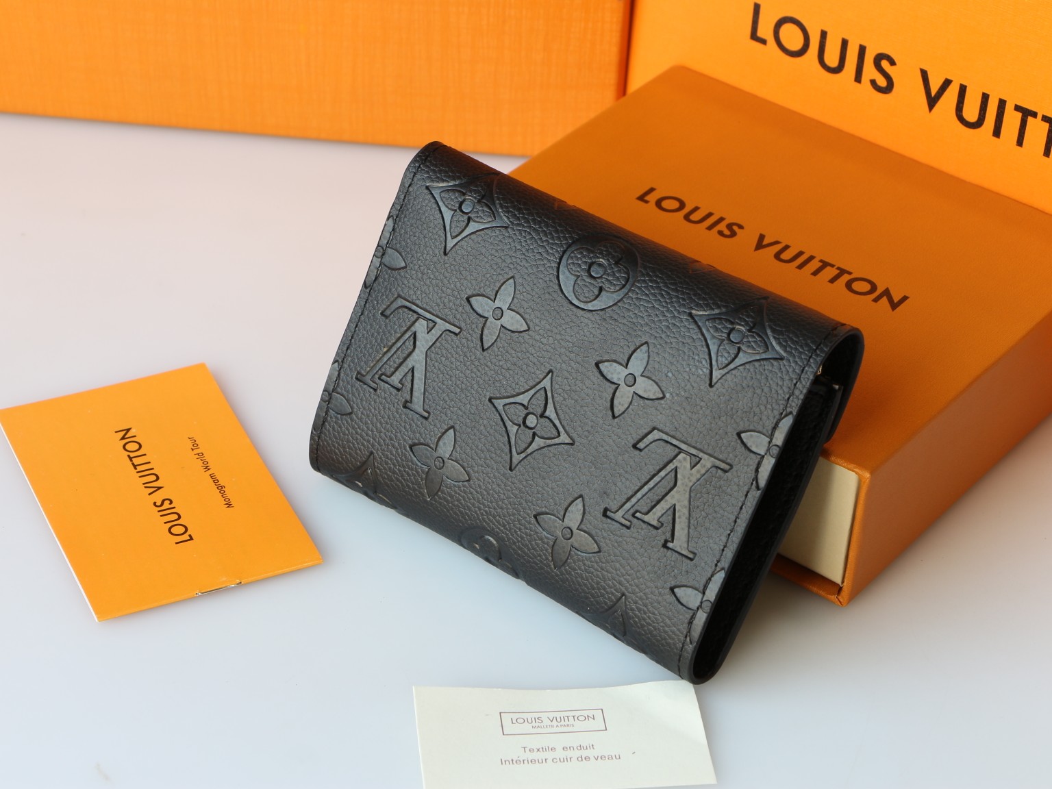 Louis Vuitton M64060 Taurillon Monogram Empreinte 二つ折り財布