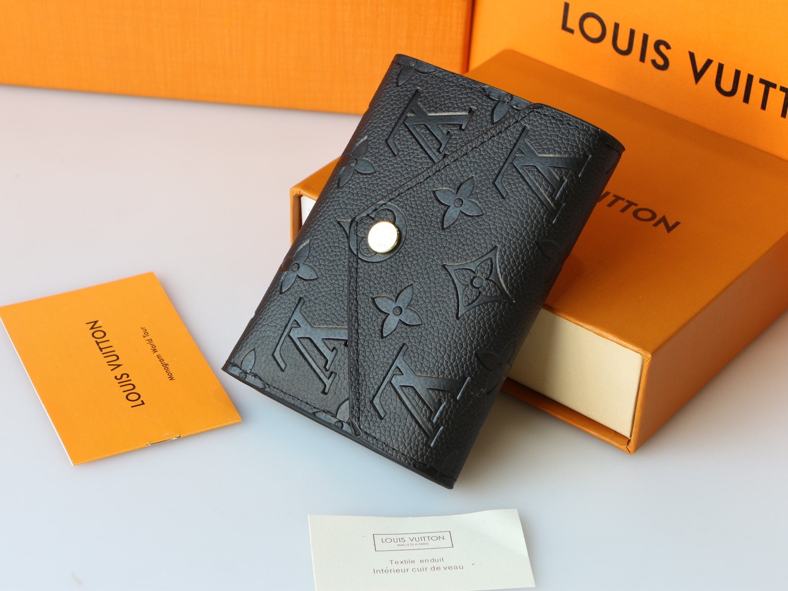Louis Vuitton M64060 Taurillon Monogram Empreinte 二つ折り財布