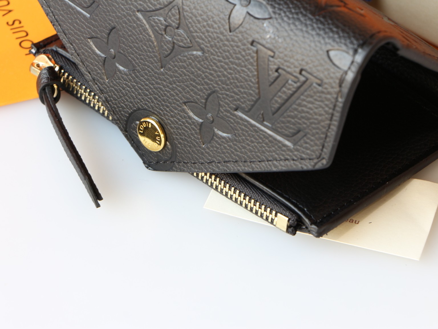 Louis Vuitton M64060 Taurillon Monogram Empreinte 二つ折り財布