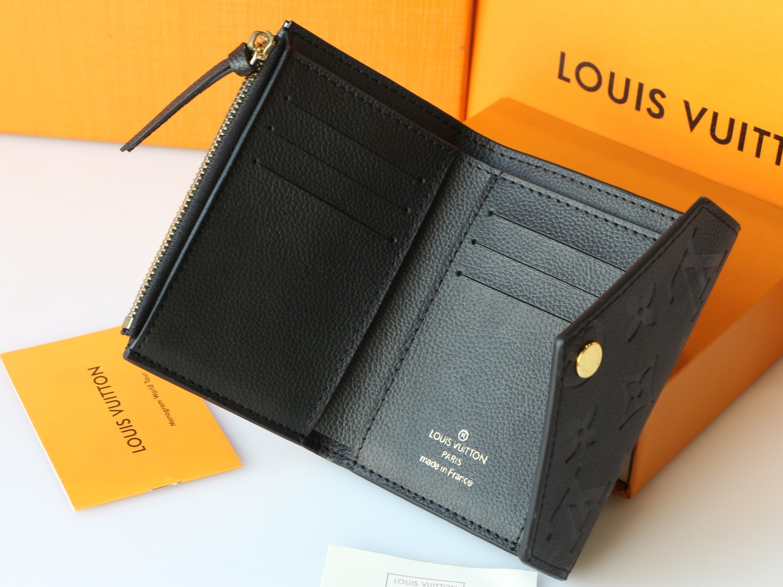 Louis Vuitton M64060 Taurillon Monogram Empreinte 二つ折り財布