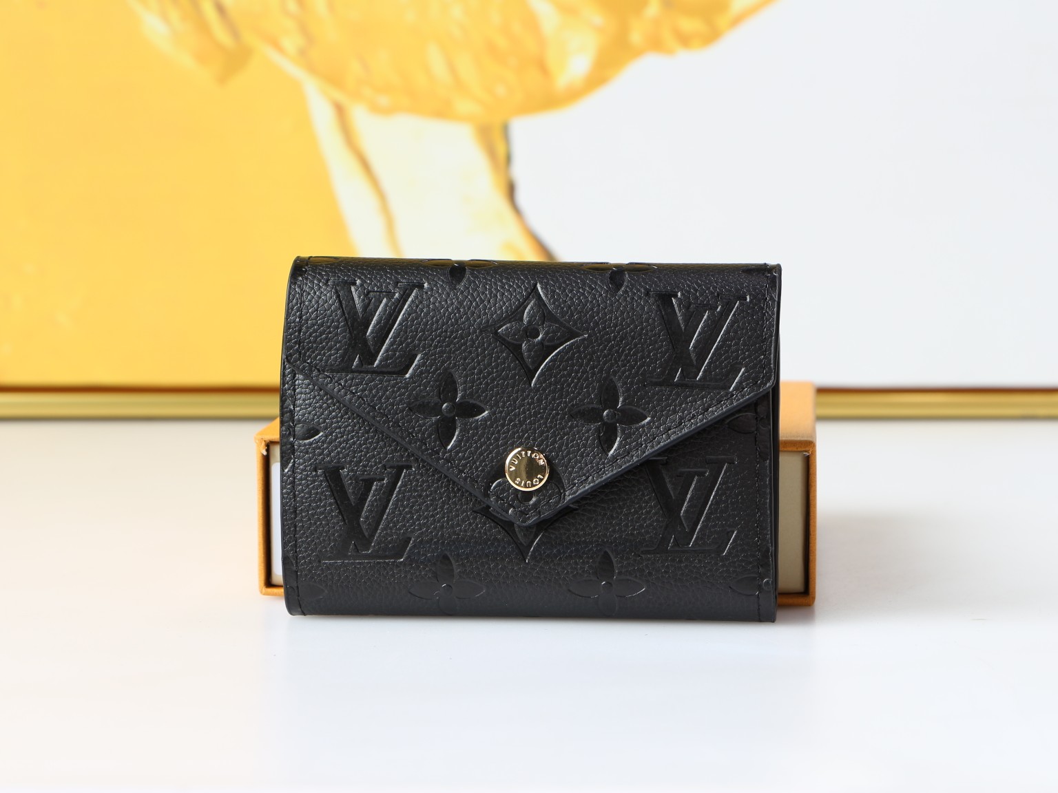 Louis Vuitton M64060 Taurillon Monogram Empreinte 二つ折り財布