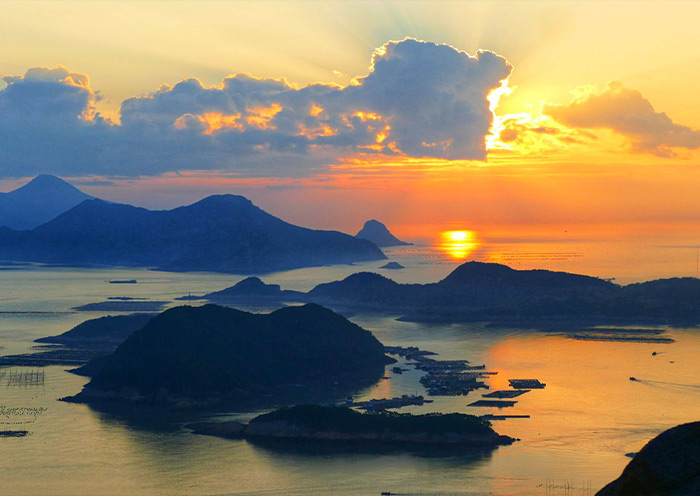 The stunning sunrise over the sea at Huazhu Village