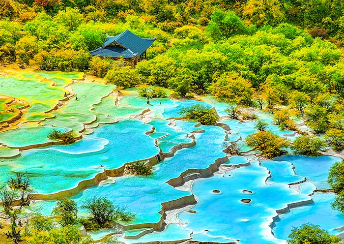 The picturesque colorful pools of Huanglong Scenic Area