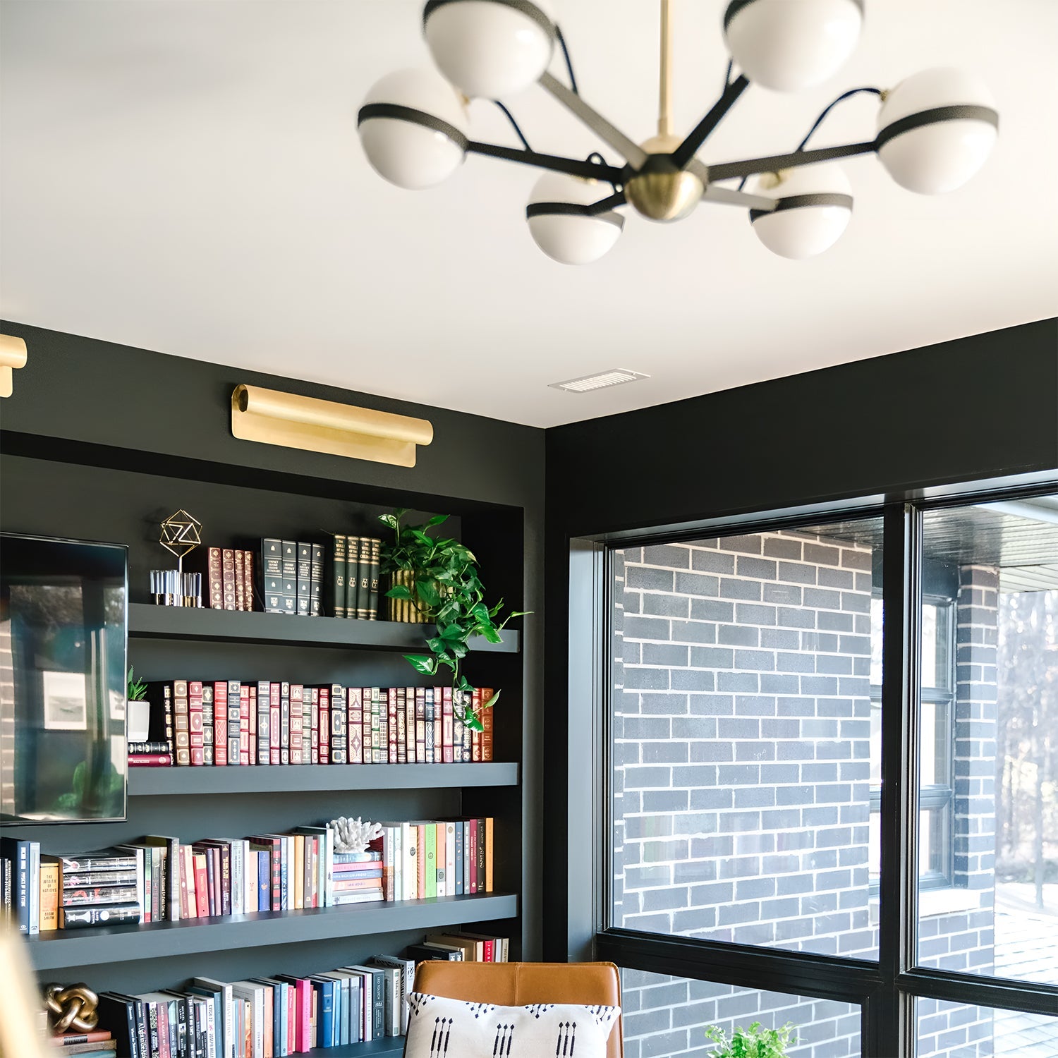 Hudson Valley Wide Aged Brass Wall Sconce