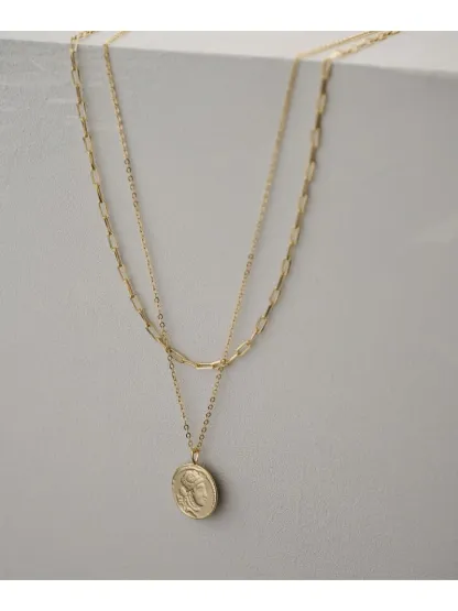 クラシカルなコインモチーフが目を引く3WAY仕様のネックレス。