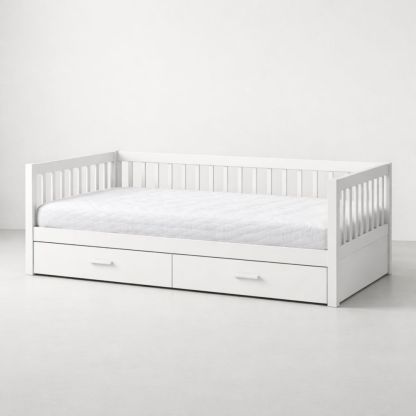 White wooden single daybed with storage drawers