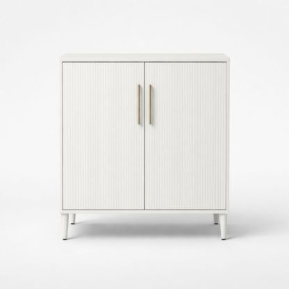 White engineered board storage cabinet with metal handles
