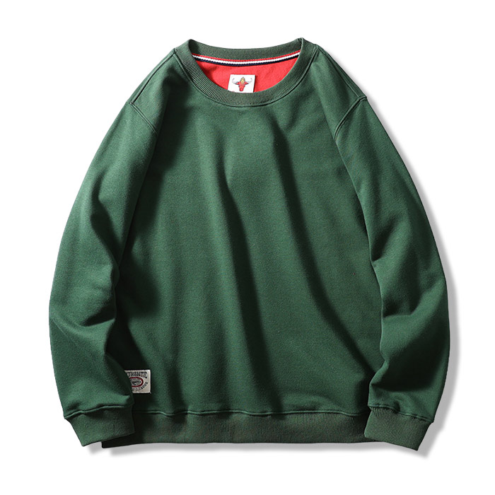 裾にシンプルなタグ付き　無地クルーネックスウェット-oakln