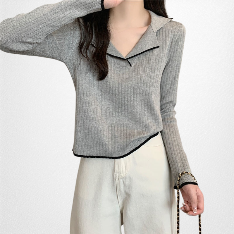 ユニークなデザイナーカラーセーター