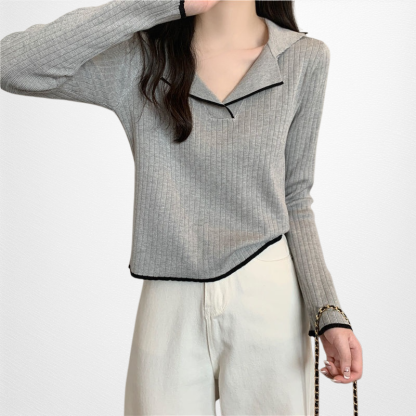 ユニークなデザイナーカラーセーター