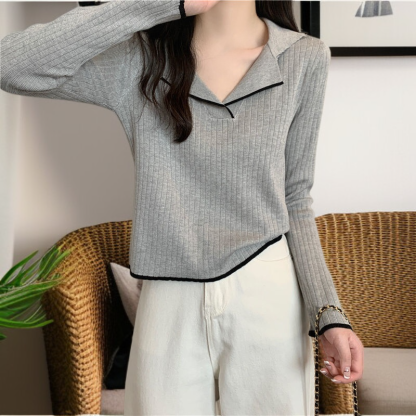 ユニークなデザイナーカラーセーター