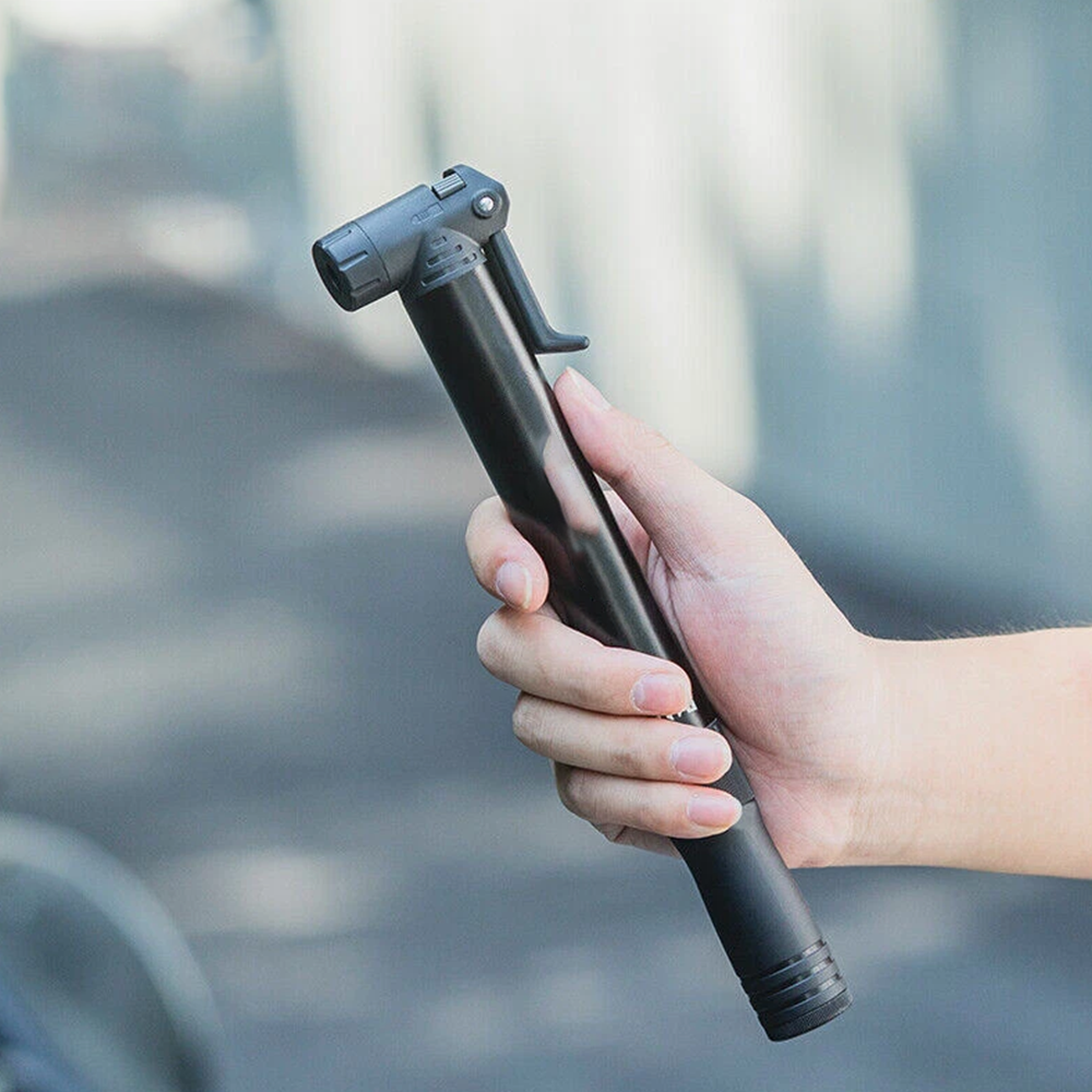 Portable bicycle air pump with rebound repair tools and bicycle accessories