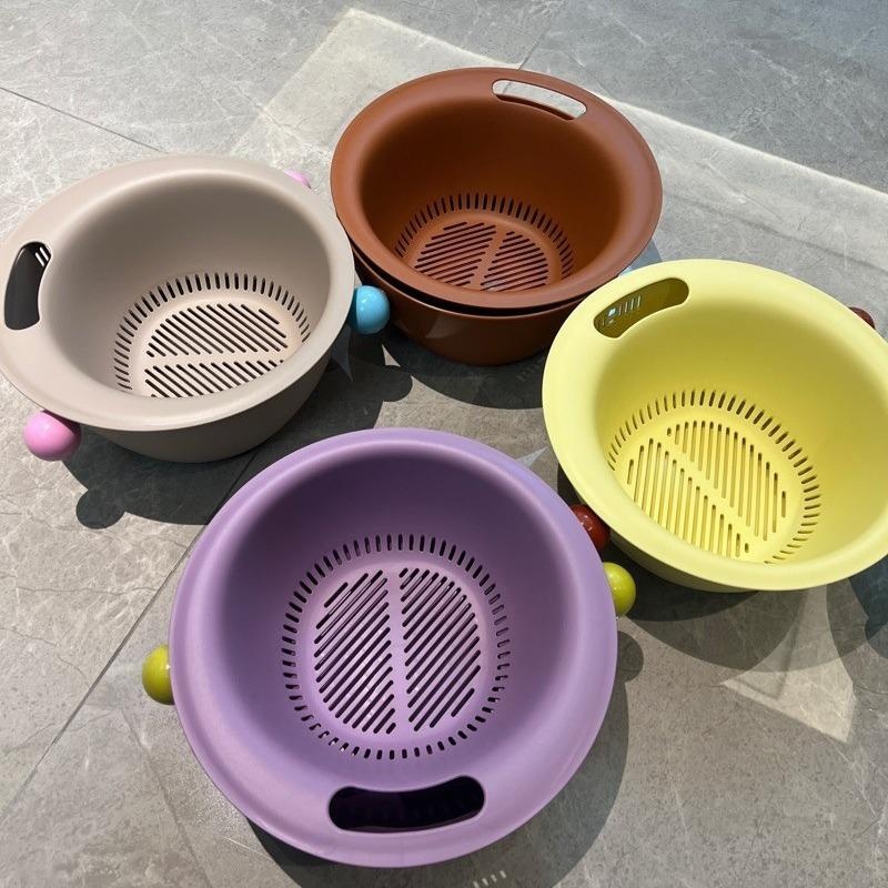 Colorful vegetable washing baskets