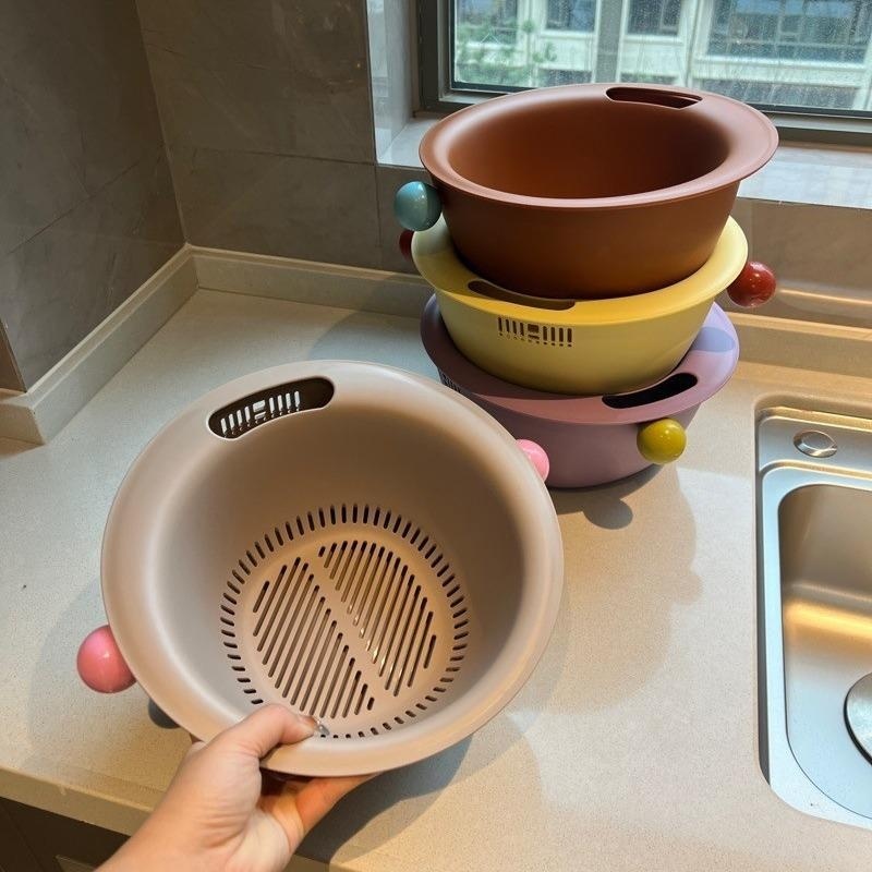 Colorful vegetable washing baskets