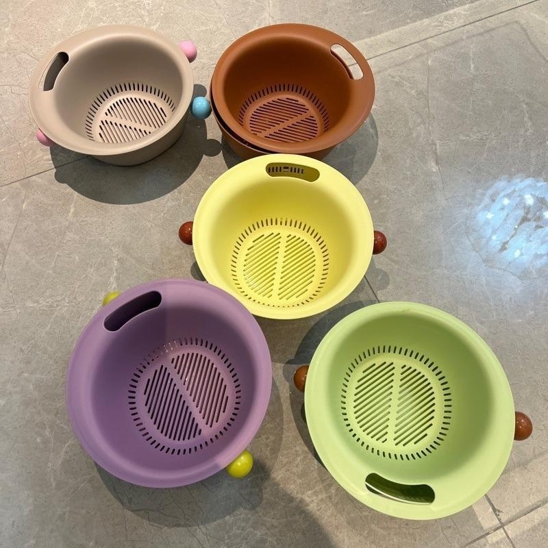 Colorful vegetable washing baskets