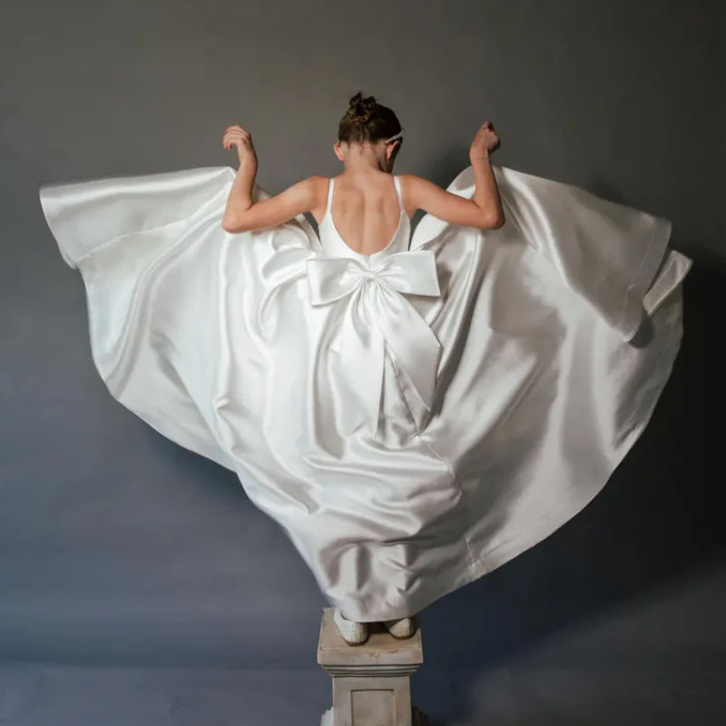 فساتين ماكسي بدون أكمام مزينة بفيونكة من الساتان - image 11