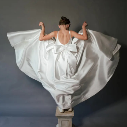 فساتين ماكسي بدون أكمام مزينة بفيونكة من الساتان - image 11