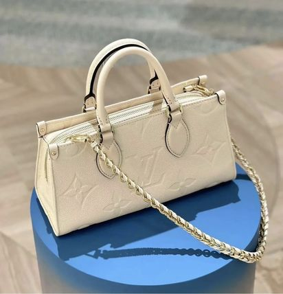 LOUIS VUITTONルイヴィトン オンザゴー EW トートバッグ ハンドバッグ ショルダー 横型スタイル ブラック ホワイト ピンク