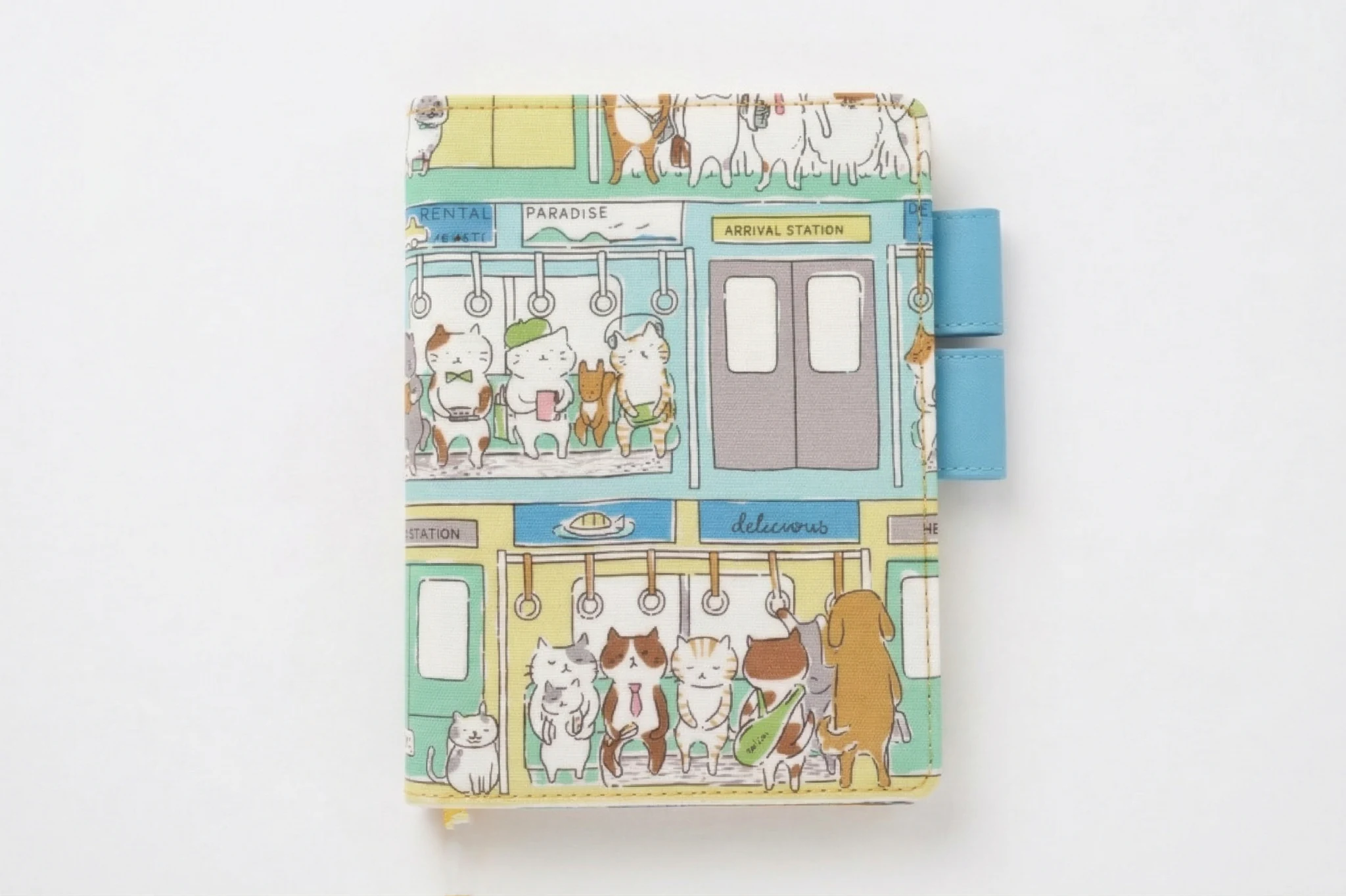 High-resolution product photo of a cat-themed fabric cover for Hobonichi planners on a seamless white background. Showcases the vivid colors of the tram illustration and premium stitching.