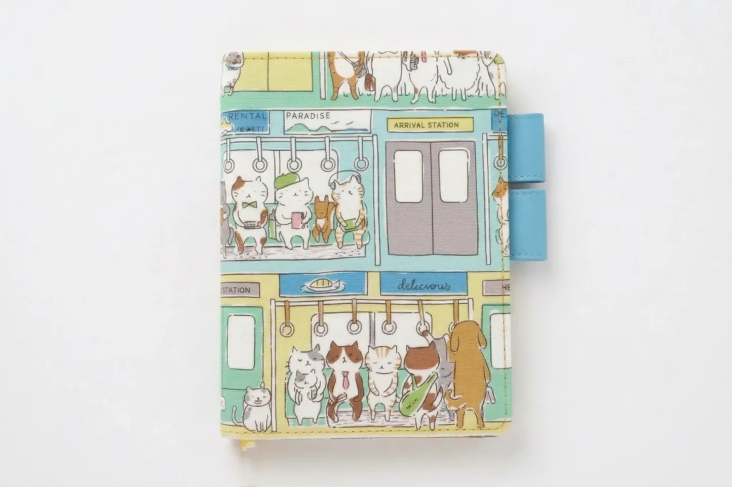 High-resolution product photo of a cat-themed fabric cover for Hobonichi planners on a seamless white background. Showcases the vivid colors of the tram illustration and premium stitching.