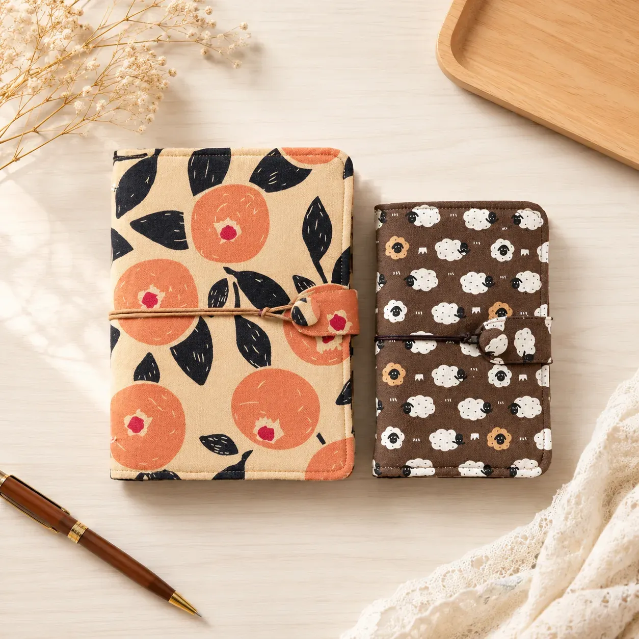 A5 and A6 budget binder cover size comparison with floral and sheep print designs