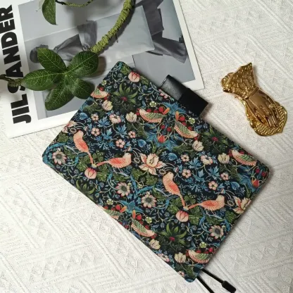 Aesthetic desk setup featuring a vintage-style floral cover styled for Hobonichi A5 on a lace background.