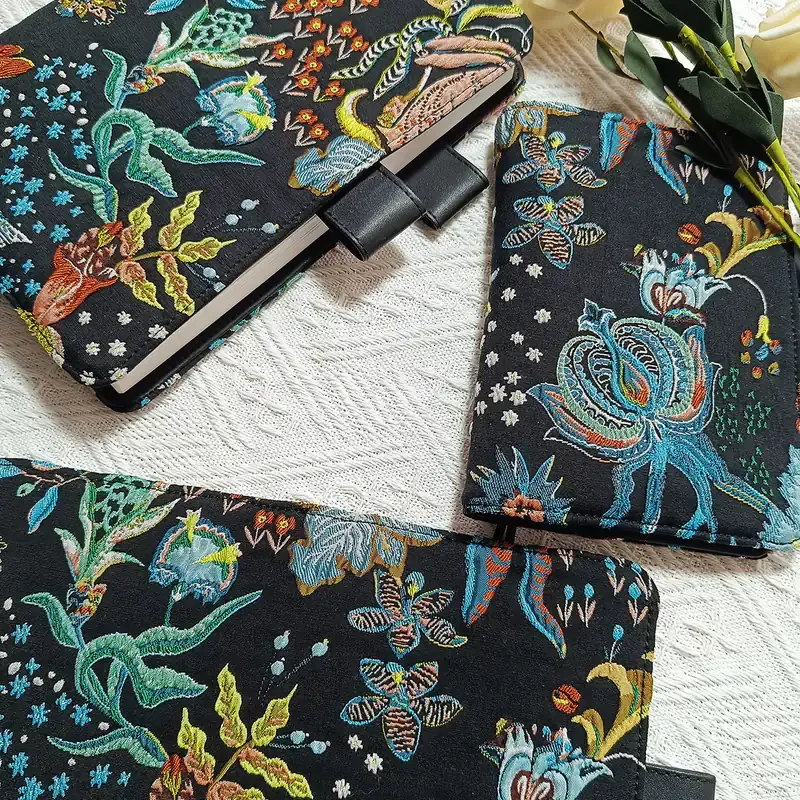 Black embroidered floral and rabbit planner cover set with notebook inserts