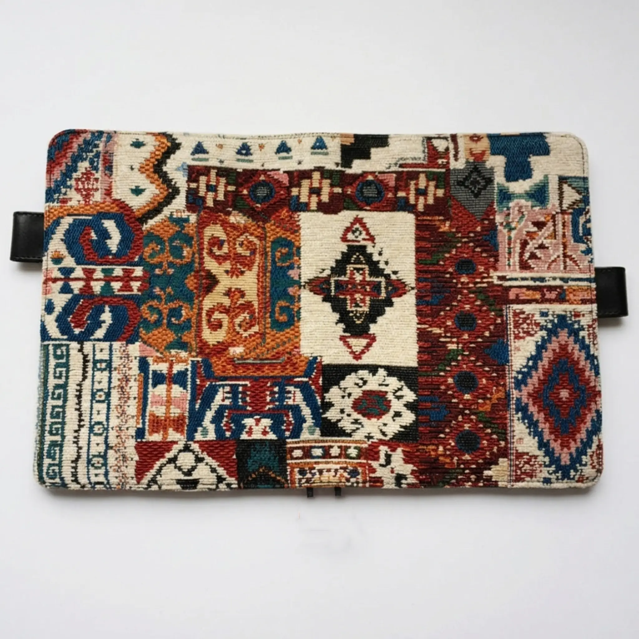 Full open view of a vintage Persian style woven cover for Hobonichi planners, showing the complete artistic pattern.