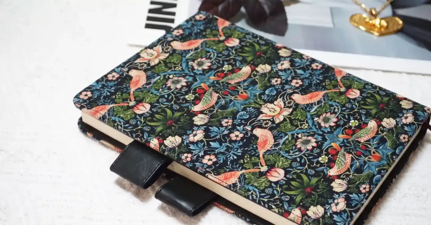 Side view showing a durable textile cover fits Hobonichi Techo A5 even with a thick notebook insert.