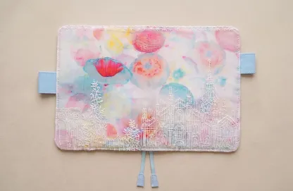 Pastel floral castle embroidered fabric cover shown flat