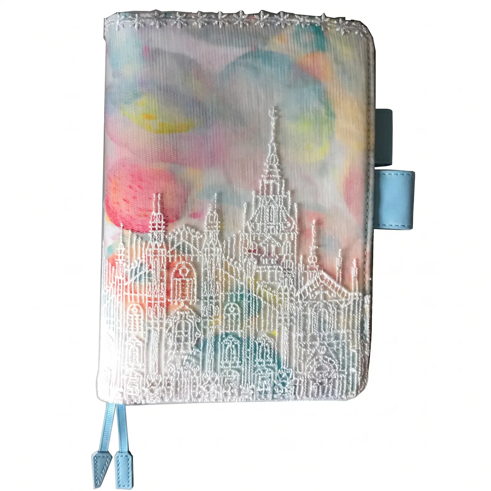 Front view of pastel floral castle fabric cover with pen loop