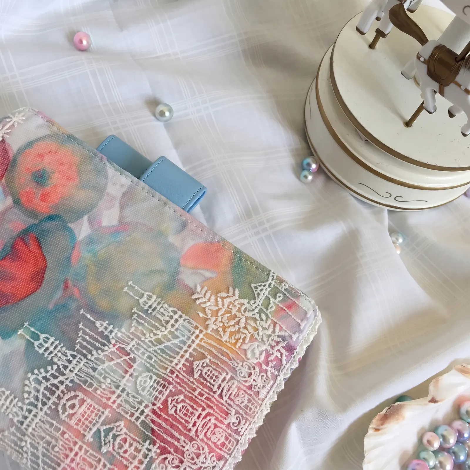 Close-up of pen loop on pastel floral castle planner cover