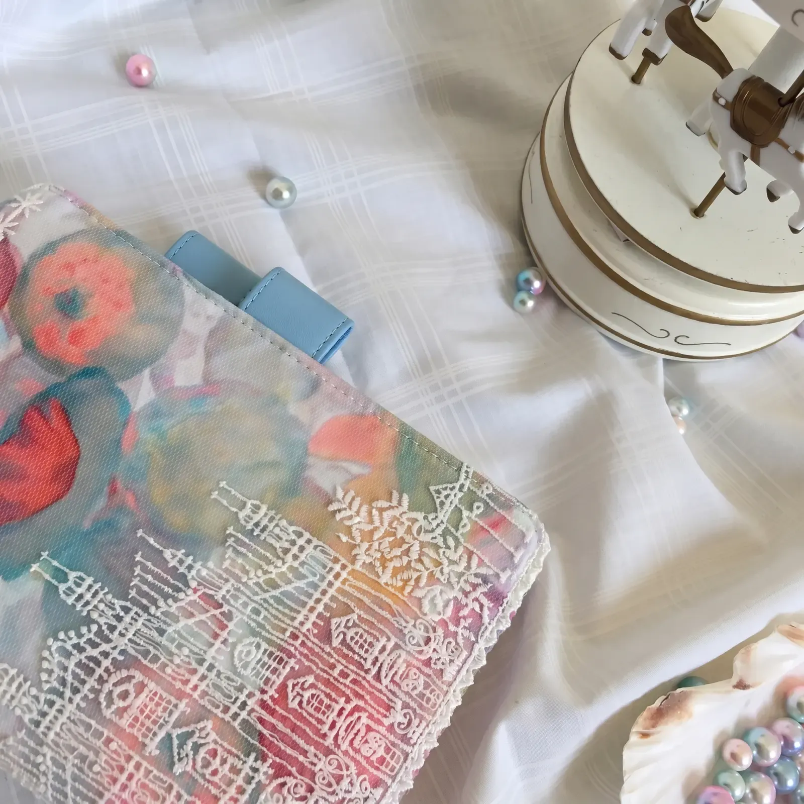 Close-up of pen loop on pastel floral castle planner cover