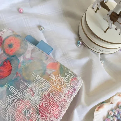 Close-up of pen loop on pastel floral castle planner cover