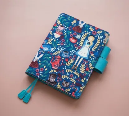Handmade embroidered fabric cover perfectly fits Hobonichi Techo A6 planner original.