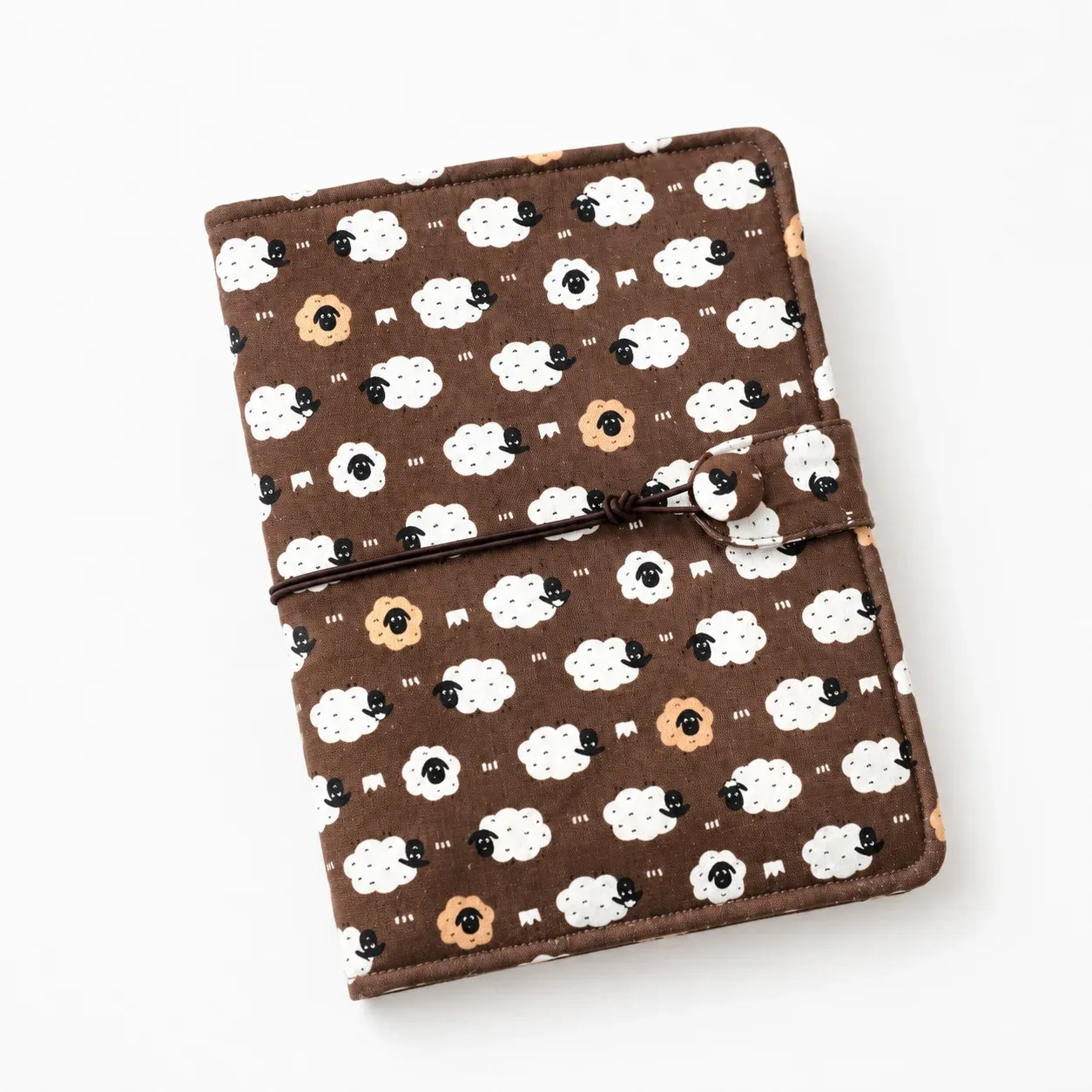 Sheep print budget binder cover with 6-ring planner design on white background