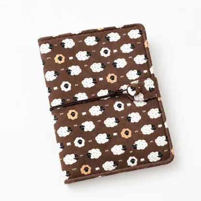 Sheep print budget binder cover with 6-ring planner design on white background