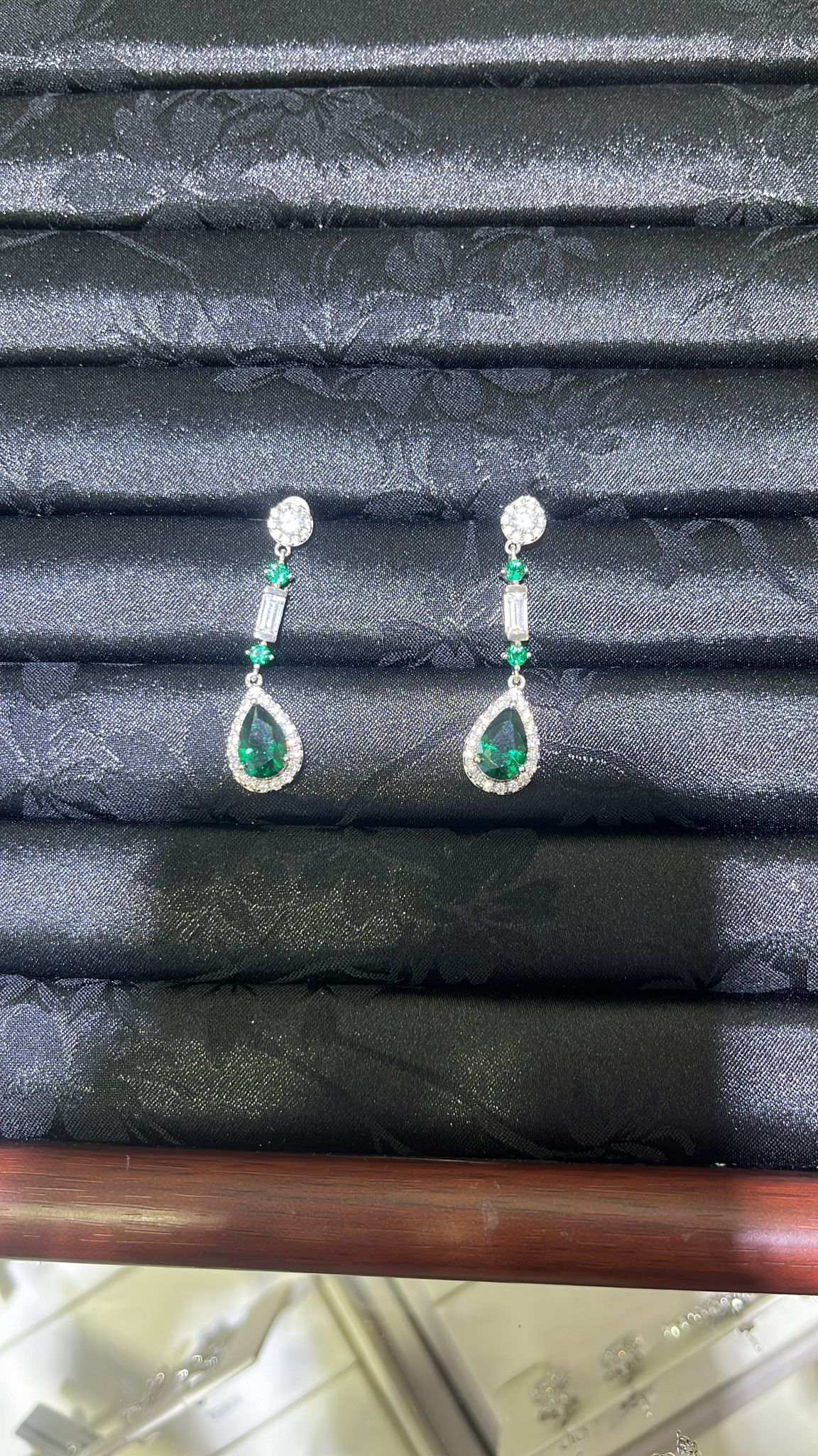 H72 LABGROWN SMALL TEARDROP EMERALD WITH SURR DIA DANGLING EARSTUD