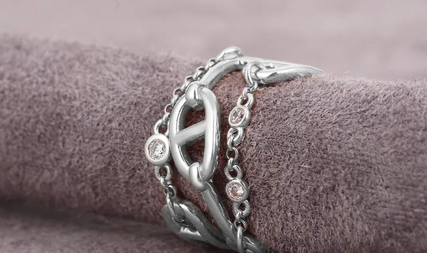 High-end pig nose chain ring for women, V gold inlaid with diamonds, three-layer cross ring, minimalist style, light luxury, wholesale from manufacturer