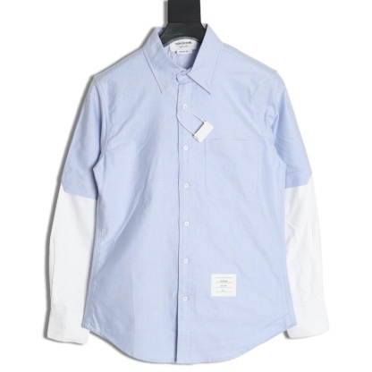 THOM BROWNE/湯姆布朗TB 雙袖拼色長袖襯衫
面料採用最新型牛津面料 扣子採用天然貝殼扣 自家品牌襯衫工廠流水線生產針距細密走線整齊  細節決定品質 三標齊全 版型可寬松可修身 男女同款 
M1 Size：1-4