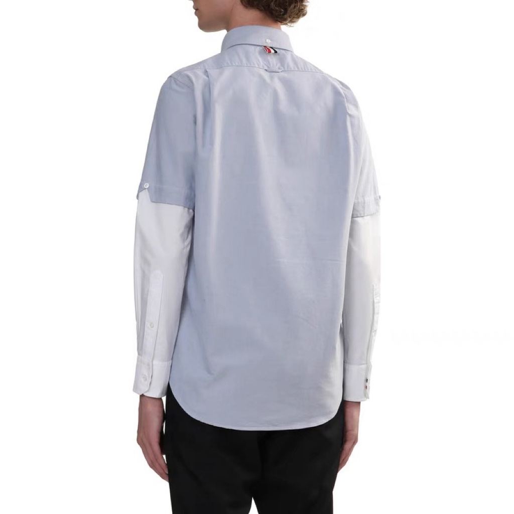 THOM BROWNE/湯姆布朗TB 雙袖拼色長袖襯衫
面料採用最新型牛津面料 扣子採用天然貝殼扣 自家品牌襯衫工廠流水線生產針距細密走線整齊  細節決定品質 三標齊全 版型可寬松可修身 男女同款 
M1 Size：1-4