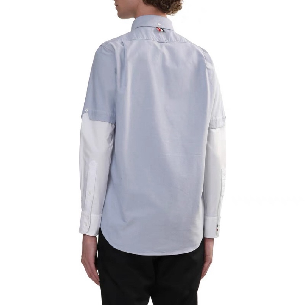 THOM BROWNE/湯姆布朗TB 雙袖拼色長袖襯衫
面料採用最新型牛津面料 扣子採用天然貝殼扣 自家品牌襯衫工廠流水線生產針距細密走線整齊  細節決定品質 三標齊全 版型可寬松可修身 男女同款 
M1 Size：1-4