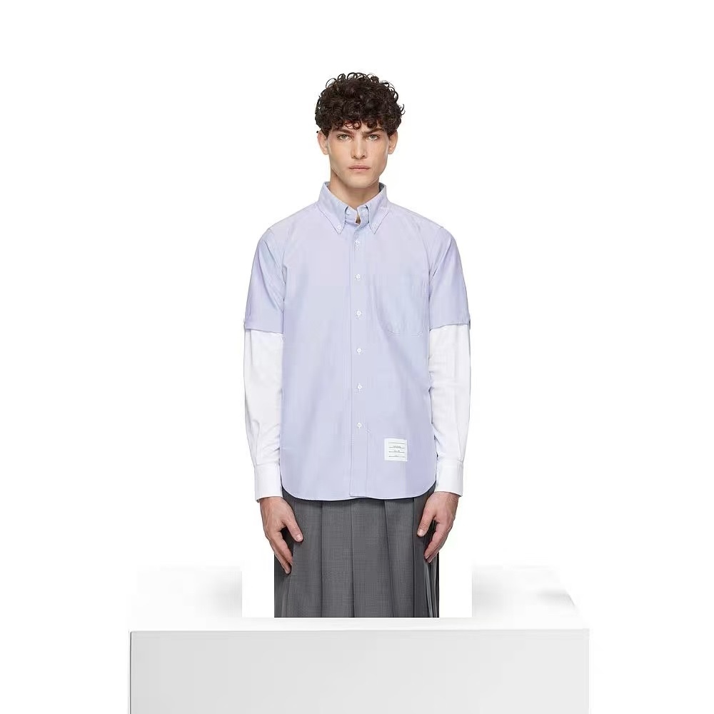 THOM BROWNE/湯姆布朗TB 雙袖拼色長袖襯衫
面料採用最新型牛津面料 扣子採用天然貝殼扣 自家品牌襯衫工廠流水線生產針距細密走線整齊  細節決定品質 三標齊全 版型可寬松可修身 男女同款 
M1 Size：1-4