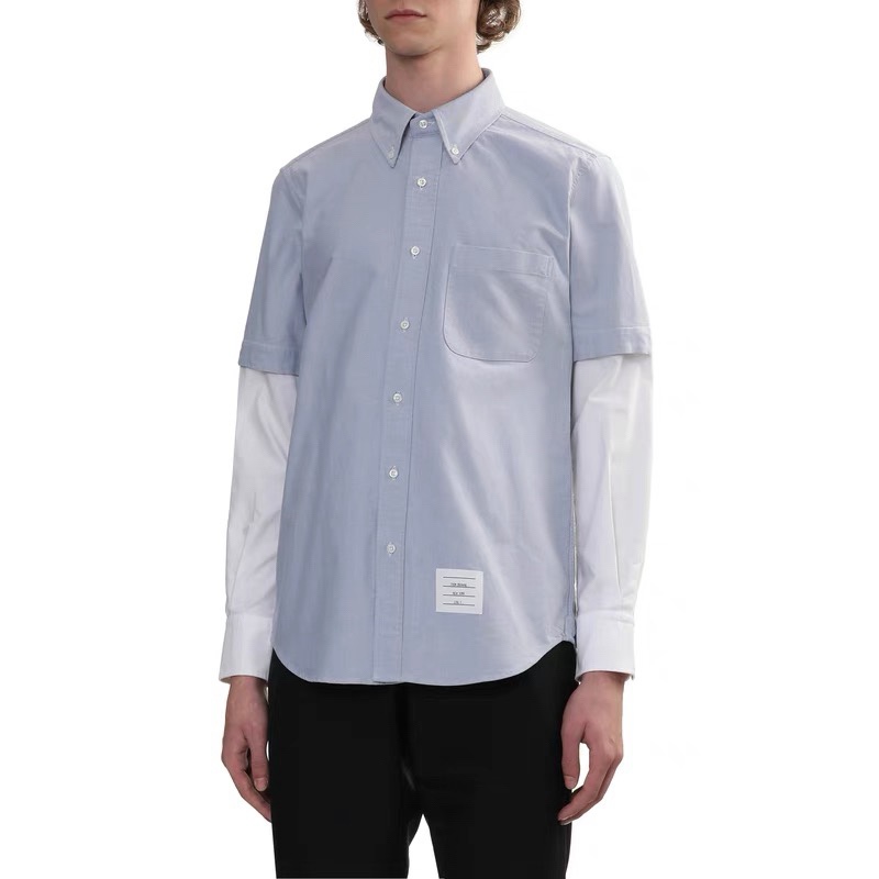 THOM BROWNE/湯姆布朗TB 雙袖拼色長袖襯衫
面料採用最新型牛津面料 扣子採用天然貝殼扣 自家品牌襯衫工廠流水線生產針距細密走線整齊  細節決定品質 三標齊全 版型可寬松可修身 男女同款 
M1 Size：1-4