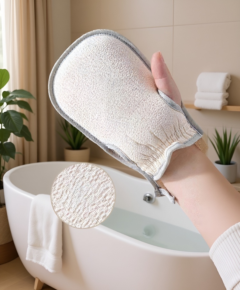 Close-up of shower scrub mitt removing dead skin