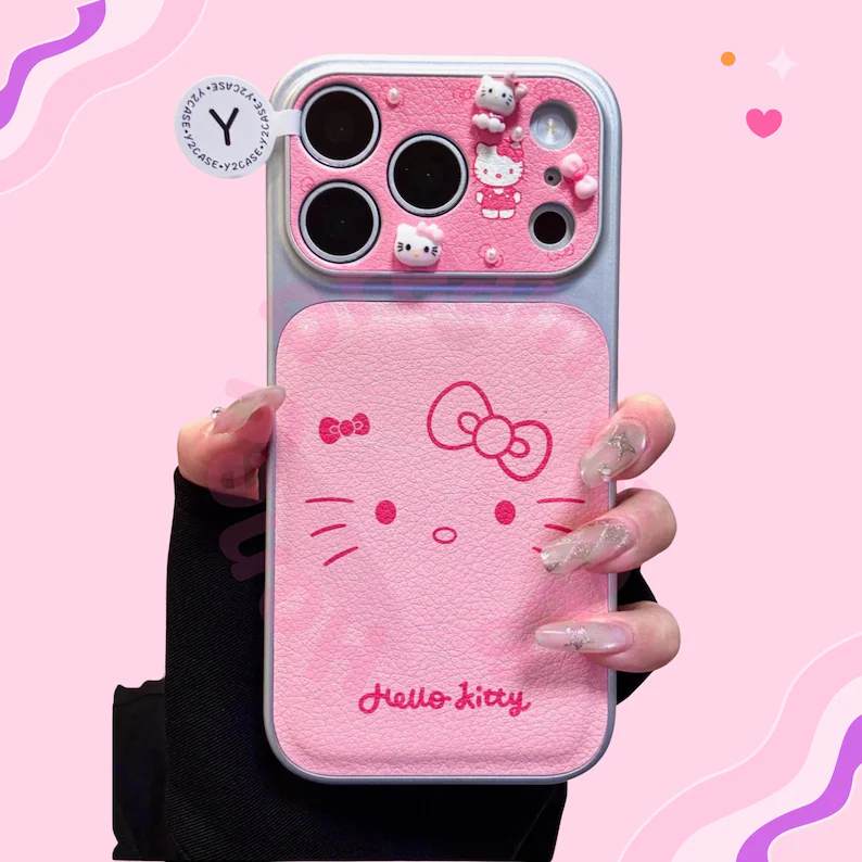ピンクのハローキティレザーiPhoneケース、リボンハローキティiPhone 17 16 15 14 13 Pro Maxケース、ハローキティiPhoneカバーケース、彼女へのギフト