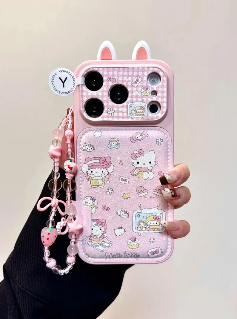 ピンクのハローキティ ウィンターケース iPhone 17/16/15/14 Pro Max、猫耳レザーカバー、かわいいスノーギンガムチェック柄、ストロベリービーズチャームギフト