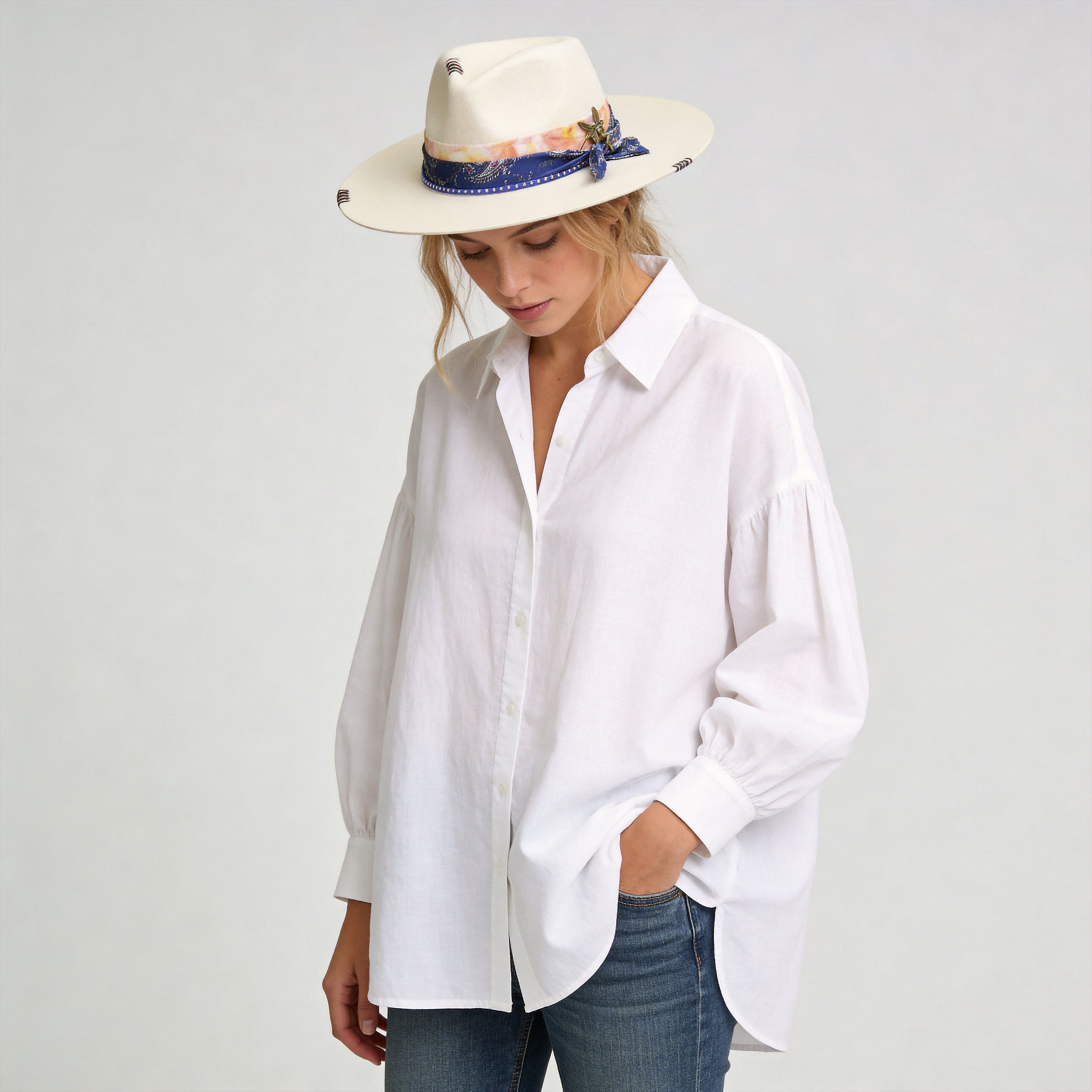 Elegant Off-White Hat with Delicate Metal Accent