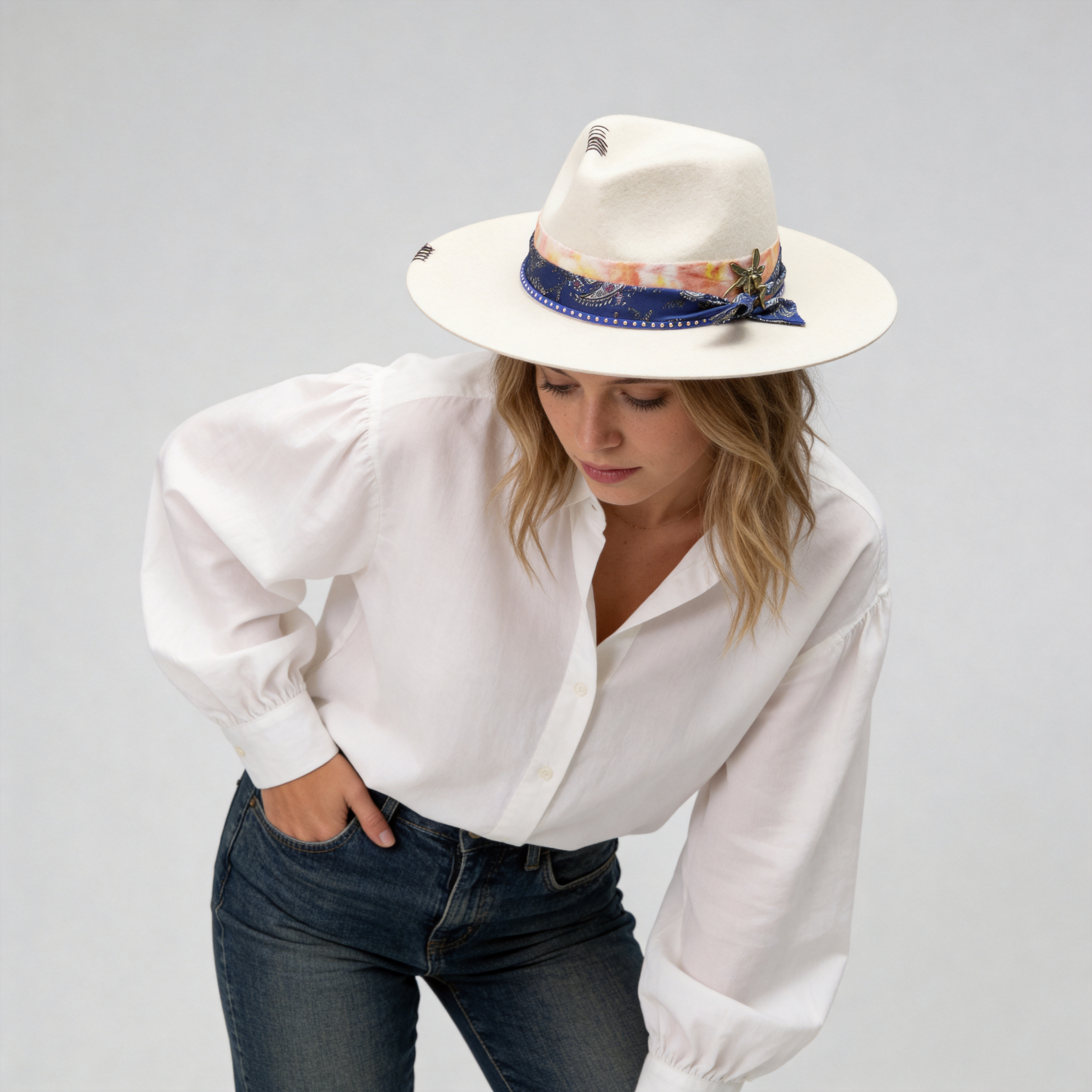 Elegant Off-White Hat with Delicate Metal Accent