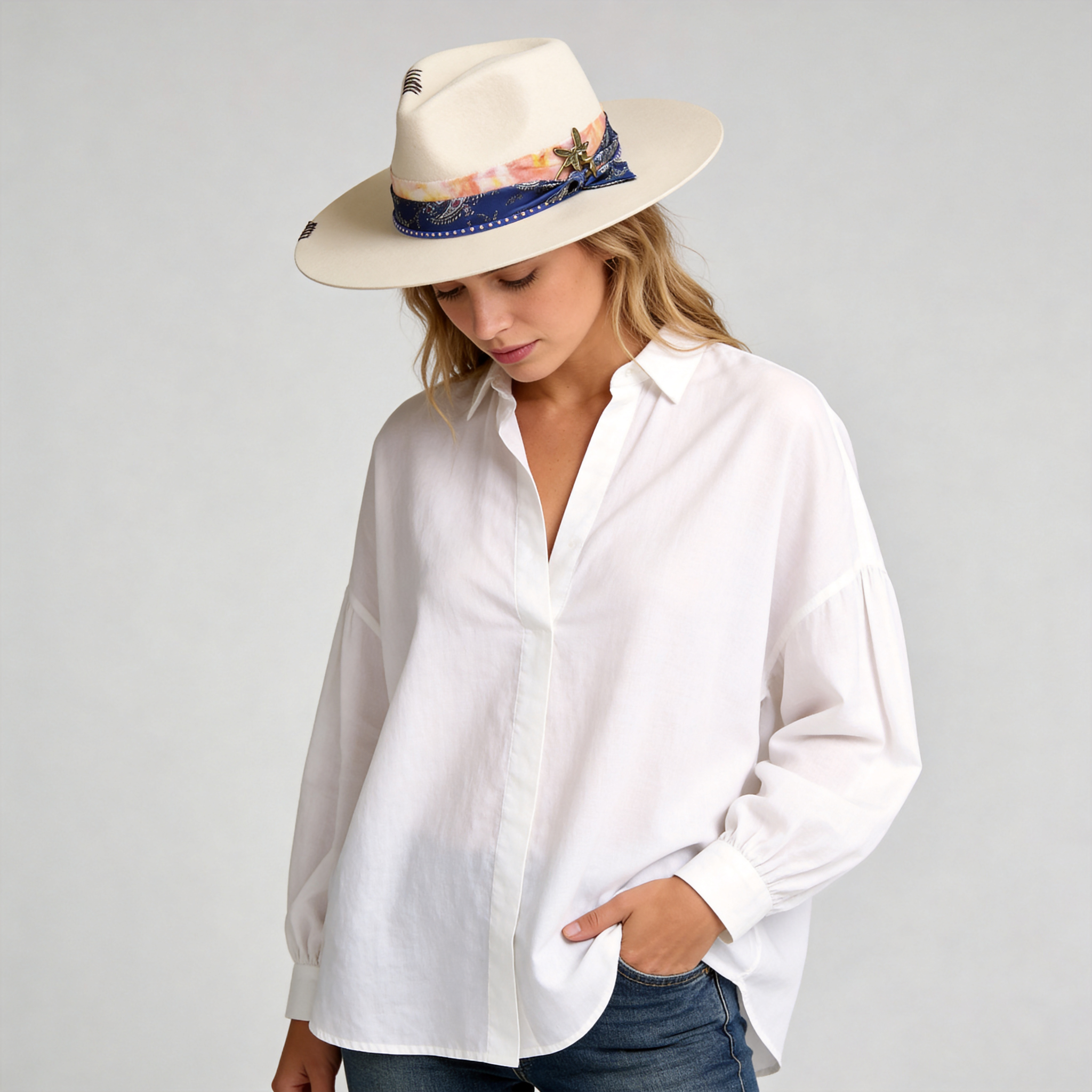Elegant Off-White Hat with Delicate Metal Accent